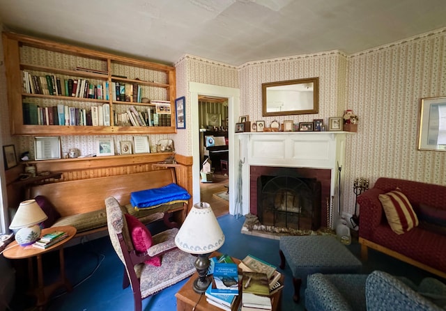 610 E Sangerville Rd, Sangerville, ME 04479 - living area with wallpapered walls and a fireplace