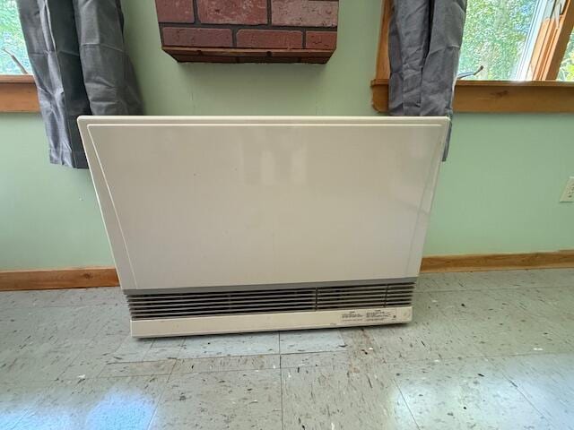 47 Tranquility Ln, Perry, ME 04667 - detailed view of baseboards and heating unit