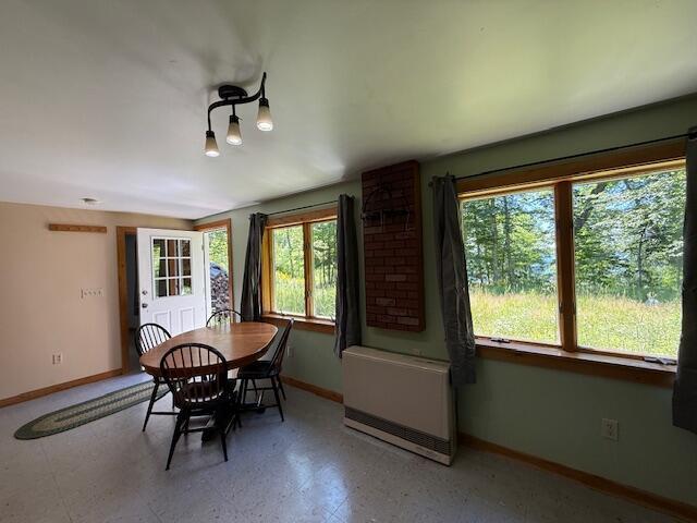 47 Tranquility Ln, Perry, ME 04667 - dining room featuring healthy amount of natural light