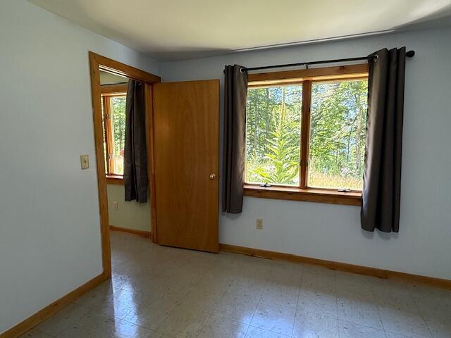 47 Tranquility Ln, Perry, ME 04667 - spare room featuring baseboards