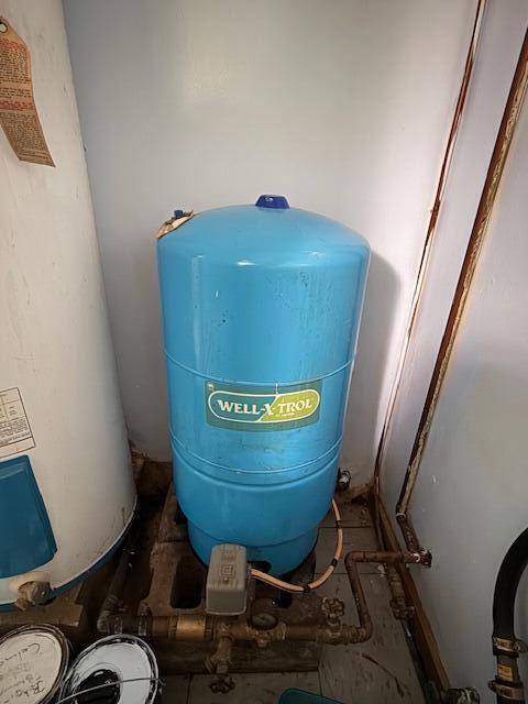 47 Tranquility Ln, Perry, ME 04667 - utility room with water heater