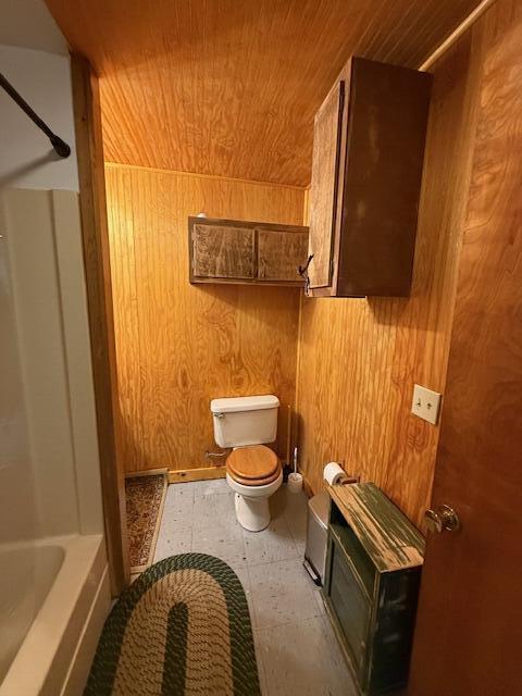 47 Tranquility Ln, Perry, ME 04667 - bathroom featuring wooden ceiling, wooden walls, and tile patterned floors