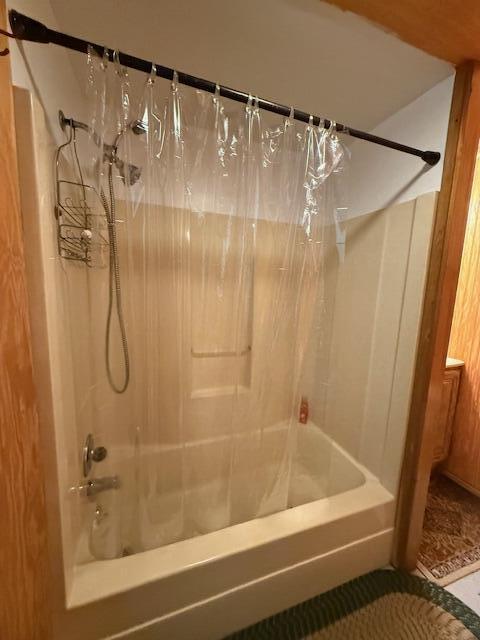 47 Tranquility Ln, Perry, ME 04667 - bathroom featuring shower / tub combo with curtain