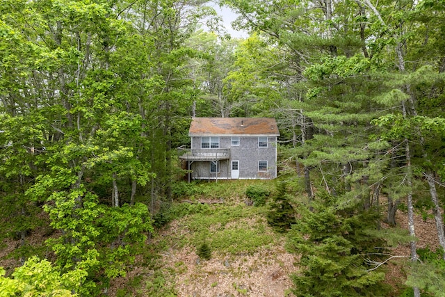124 Main Rd, Westport Island, ME 04578 - back of house with a wooded view