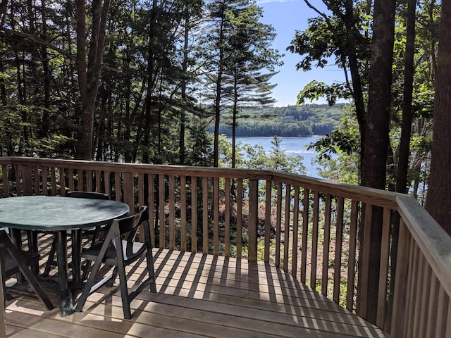 124 Main Rd, Westport Island, ME 04578 - wooden terrace featuring a water view, a wooded view, and outdoor dining area