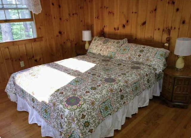 124 Main Rd, Westport Island, ME 04578 - bedroom with wood finished floors and wood walls