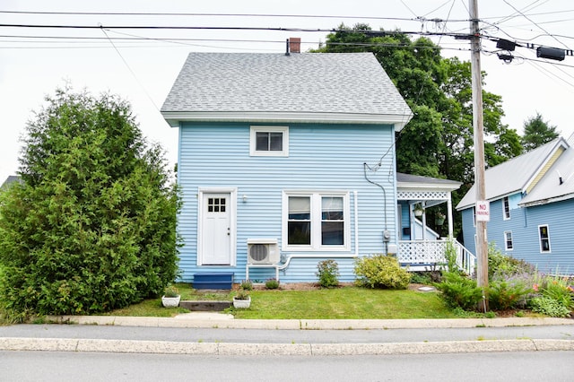 26 Elm St, Old Town, ME 04468 - view of front of property featuring roof with shingles, a chimney, and a front yard
