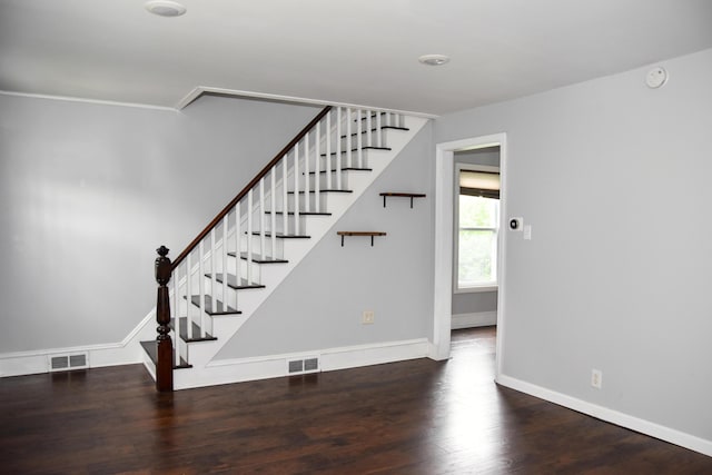 26 Elm St, Old Town, ME 04468 - staircase featuring wood finished floors and baseboards