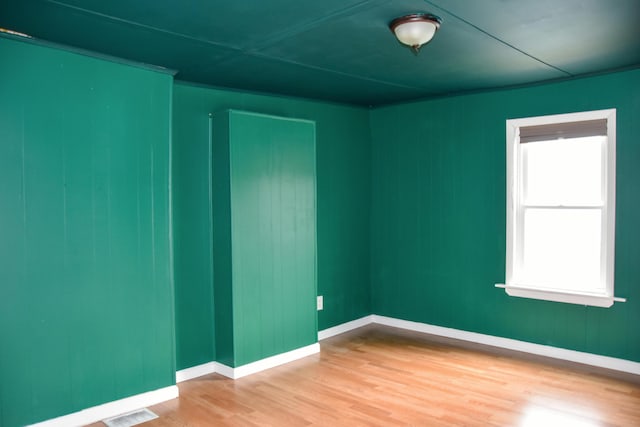 26 Elm St, Old Town, ME 04468 - unfurnished room with wood finished floors and baseboards