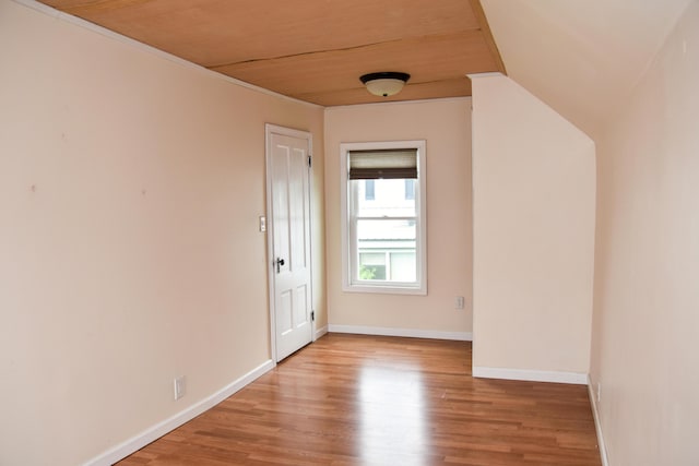26 Elm St, Old Town, ME 04468 - empty room featuring light wood-style flooring and wooden ceiling