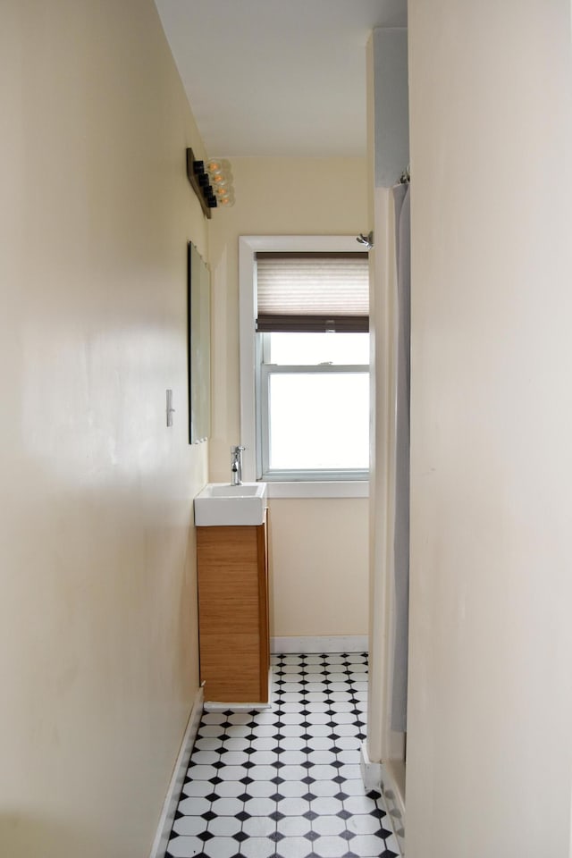 26 Elm St, Old Town, ME 04468 - bathroom featuring tile patterned floors and vanity