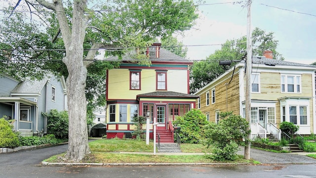 93 Fessenden St, Portland, ME 04103 - view of front facade featuring a shingled roof