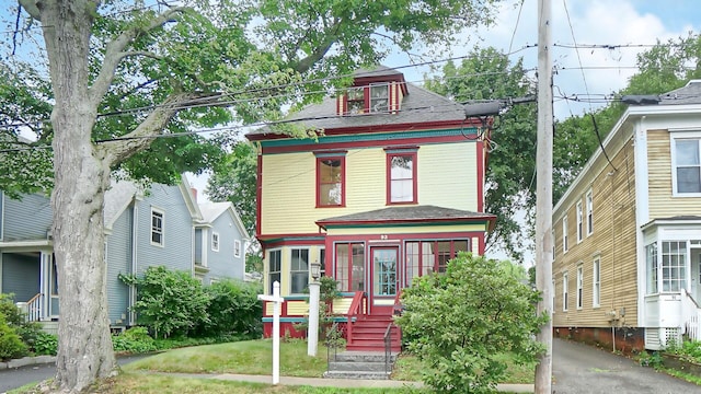 93 Fessenden St, Portland, ME 04103 - victorian-style house with a shingled roof