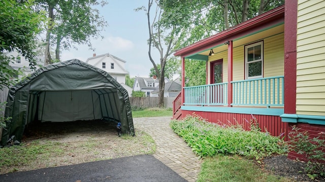 93 Fessenden St, Portland, ME 04103 - view of yard featuring covered porch and a carport