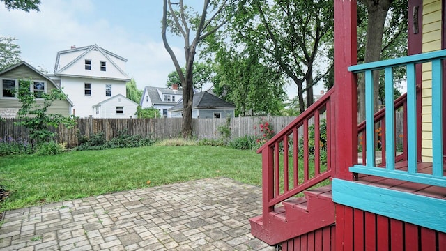 93 Fessenden St, Portland, ME 04103 - fenced backyard featuring a patio and a residential view