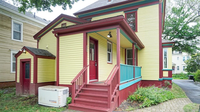 93 Fessenden St, Portland, ME 04103 - victorian house with a porch and a shingled roof