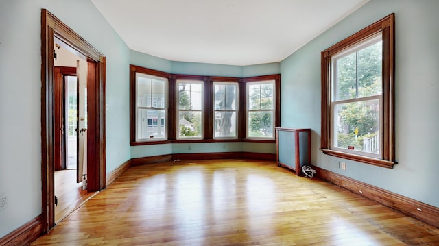 93 Fessenden St, Portland, ME 04103 - empty room with light wood finished floors and baseboards