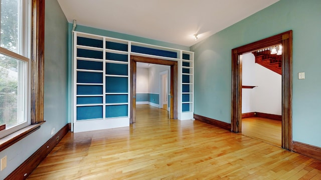 93 Fessenden St, Portland, ME 04103 - unfurnished room featuring wood finished floors and baseboards