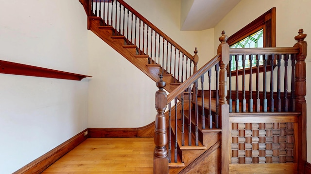93 Fessenden St, Portland, ME 04103 - stairs featuring wood-type flooring