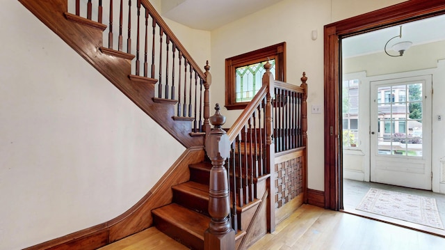 93 Fessenden St, Portland, ME 04103 - stairs featuring healthy amount of natural light and wood finished floors