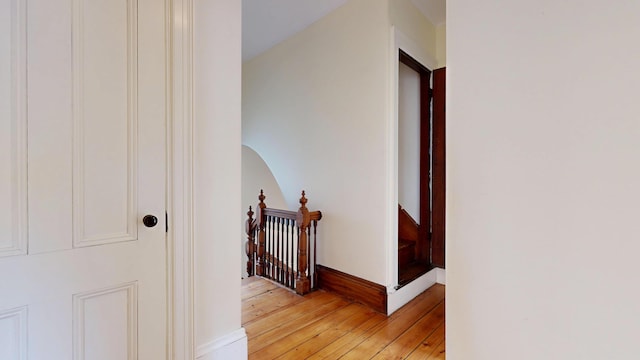 93 Fessenden St, Portland, ME 04103 - corridor featuring light wood-type flooring and an upstairs landing