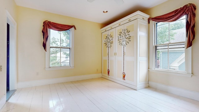 93 Fessenden St, Portland, ME 04103 - unfurnished room with healthy amount of natural light and wood finished floors