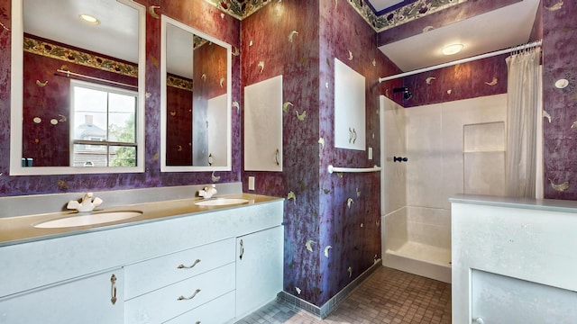 93 Fessenden St, Portland, ME 04103 - full bathroom featuring curtained shower, double vanity, and tile patterned flooring