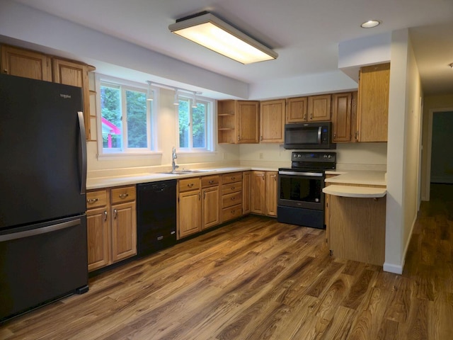 411 Augusta Rd, Belgrade, ME 04917 - kitchen featuring black appliances, light countertops, dark wood-style flooring, recessed lighting, and open shelves