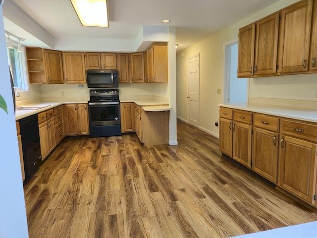 411 Augusta Rd, Belgrade, ME 04917 - kitchen with electric range oven, dishwasher, brown cabinetry, dark wood-style floors, and light countertops