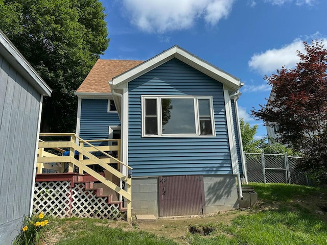 31 Blake St, Brewer, ME 04412 - rear view of house featuring a shingled roof, a deck, and stairs