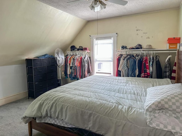 31 Blake St, Brewer, ME 04412 - carpeted bedroom featuring vaulted ceiling, a textured ceiling, and ceiling fan
