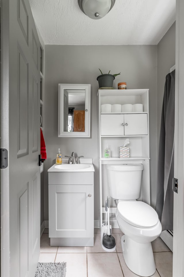 230 W Old Main Rd, Lowell, ME 04493 - bathroom featuring vanity and tile patterned floors