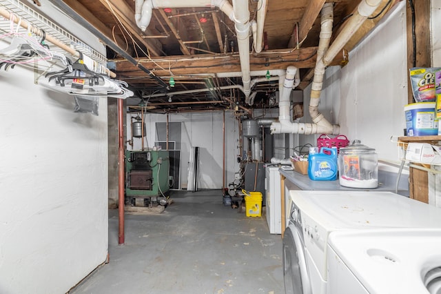 230 W Old Main Rd, Lowell, ME 04493 - unfinished below grade area with washer and dryer and a heating unit