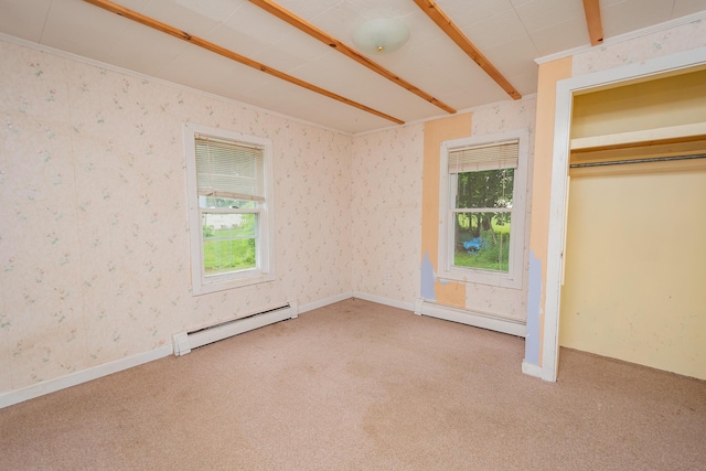180 Lawrence St, Dover-Foxcroft, ME 04426 - unfurnished bedroom with baseboard heating, carpet flooring, and wallpapered walls