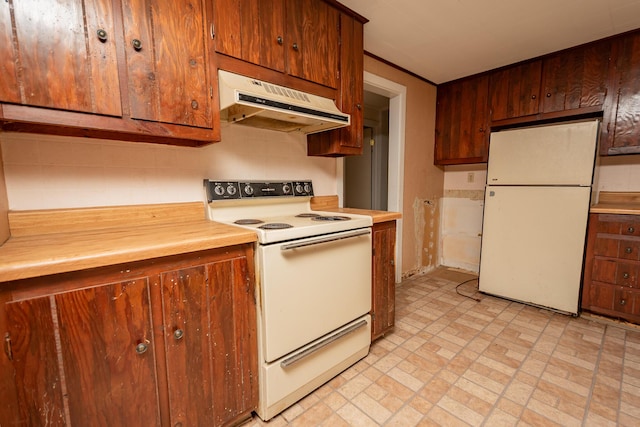 180 Lawrence St, Dover-Foxcroft, ME 04426 - kitchen featuring white appliances, under cabinet range hood, and brick patterned floors