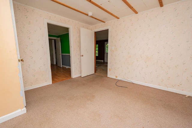 180 Lawrence St, Dover-Foxcroft, ME 04426 - spare room featuring carpet floors and wallpapered walls