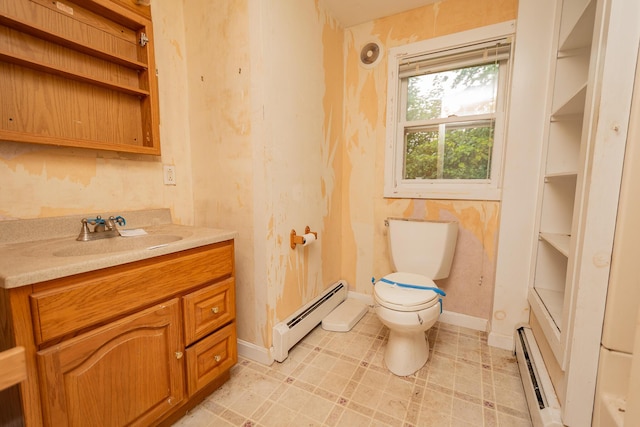 180 Lawrence St, Dover-Foxcroft, ME 04426 - bathroom with a baseboard heating unit, a baseboard radiator, and vanity
