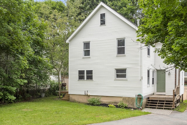26 Wesley St Ct, Bath, ME 04530 - rear view of house with a yard