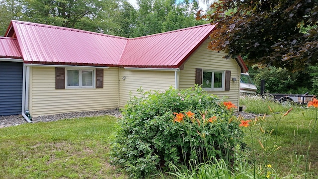393 Lagrange Rd, Bradford, ME 04410 - view of front of home with a metal roof and a front lawn