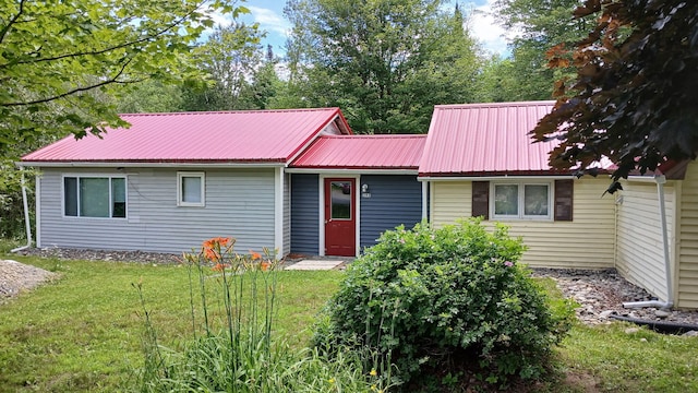 393 Lagrange Rd, Bradford, ME 04410 - ranch-style home featuring a front yard and a metal roof