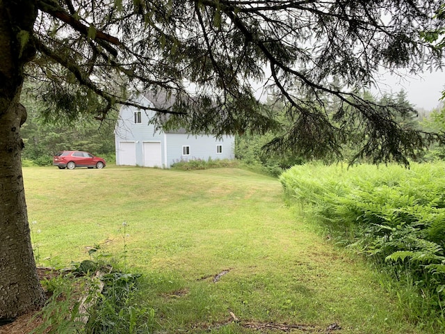 150 Leach Point Rd, Perry, ME 04667 - view of grassy yard featuring driveway