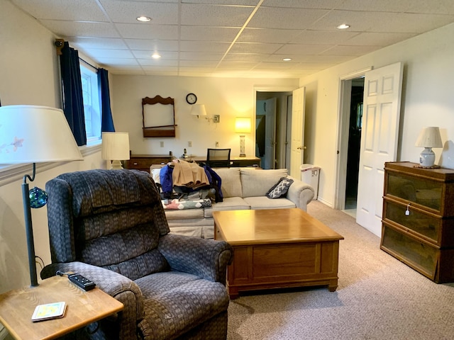 150 Leach Point Rd, Perry, ME 04667 - living room featuring light colored carpet, a paneled ceiling, and recessed lighting