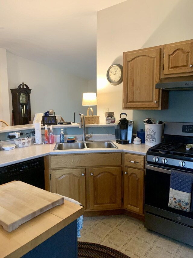 150 Leach Point Rd, Perry, ME 04667 - kitchen featuring stainless steel range with gas cooktop, dishwasher, under cabinet range hood, and light countertops