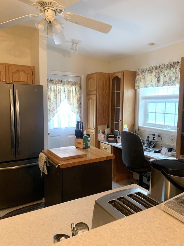 150 Leach Point Rd, Perry, ME 04667 - kitchen featuring freestanding refrigerator, ceiling fan, an office area, and glass insert cabinets