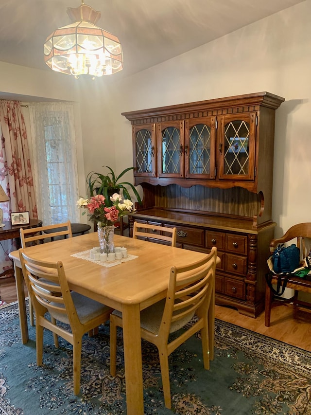 150 Leach Point Rd, Perry, ME 04667 - dining space with a chandelier and light wood finished floors
