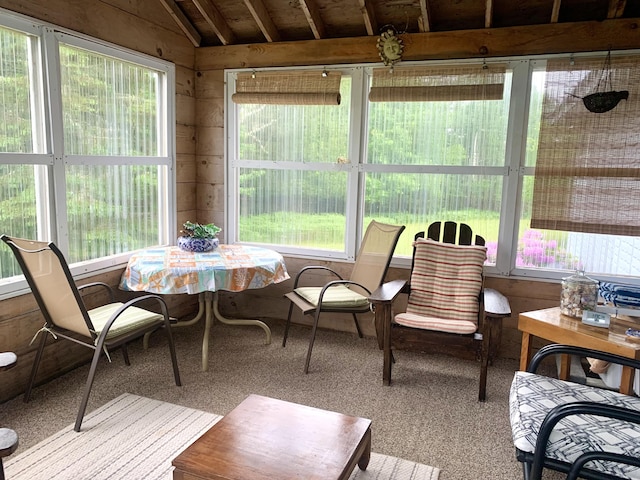 150 Leach Point Rd, Perry, ME 04667 - sunroom with lofted ceiling, carpet, and wood walls