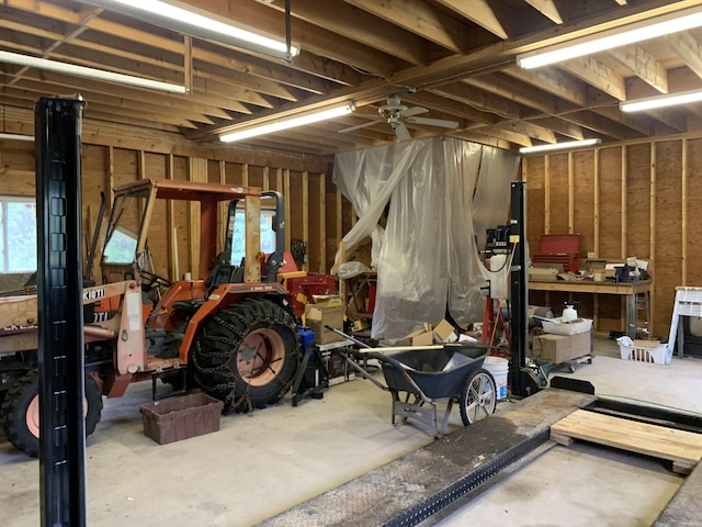 150 Leach Point Rd, Perry, ME 04667 - basement with ceiling fan, plenty of natural light, and a workshop area