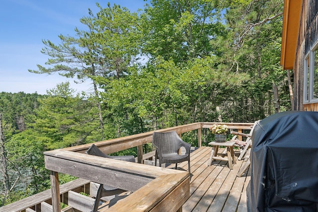 911 Orion Point Way, Harpswell, ME 04079 - wooden deck featuring grilling area and a view of trees