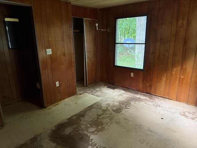 489 Lovejoy Pond Rd, Fayette, ME 04349 - unfurnished bedroom with wooden walls and a closet