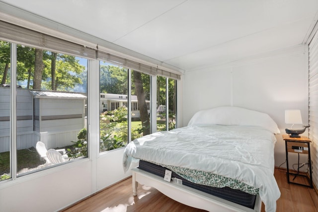 191 Tatnic Rd Unit 74, Wells, ME 04090 - bedroom featuring wood finished floors and ornamental molding